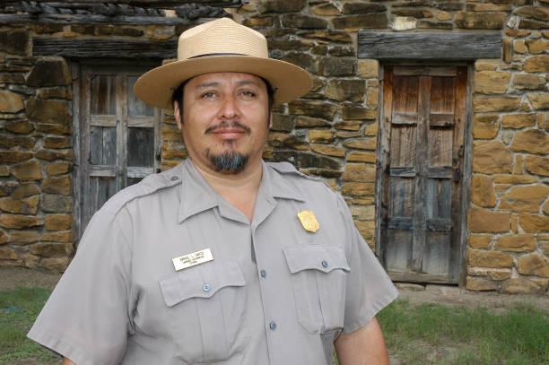 Texas, United States - September 22, 2006: Hispanic guide in the old Mission San Jose near the city of San Antonio
