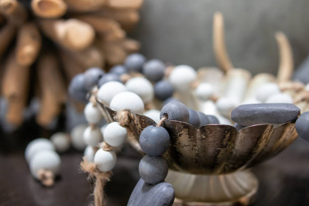 istock Wood pearls decoration on table, close up. 1358275780