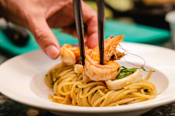 istock Shrimps Prawn Pasta Spaghetti served in a white plate 1358278455