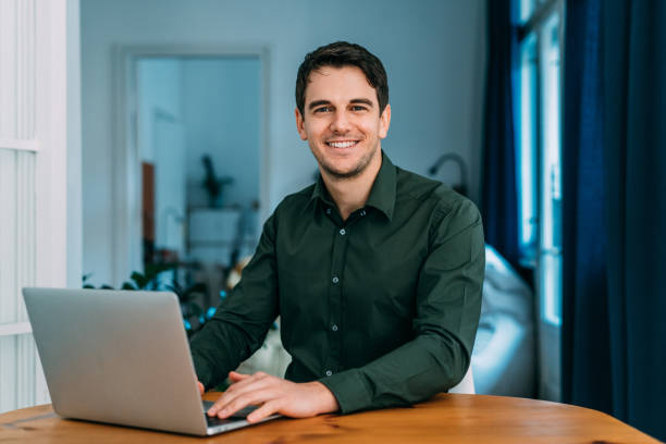 istock Confident businessman in his office. 1358280238