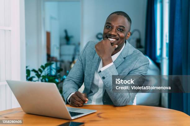 Confident Businessman In His Office Stock Photo - Download Image Now - African Ethnicity, African-American Ethnicity, Men
