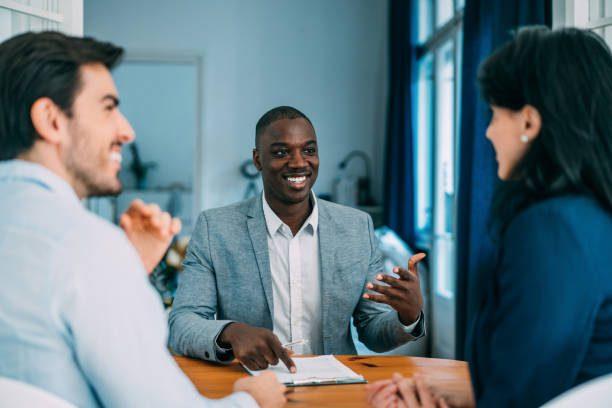 group of business persons talking in the office. - board room discussion contract agreement imagens e fotografias de stock