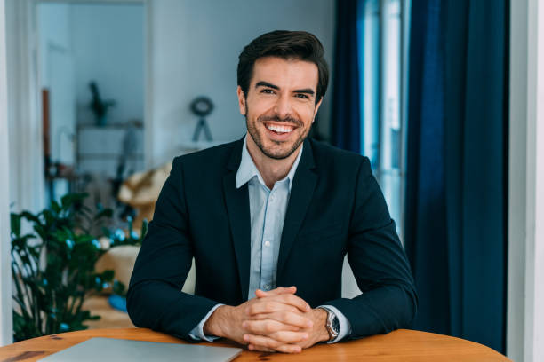 istock Confident businessman in his office. 1358280625