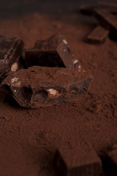 istock Top view of dark chocolate blocks crashed into pieces 1358285730