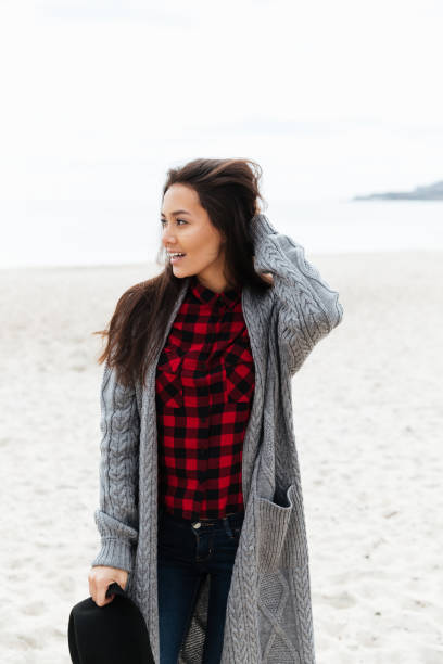 istock Smiling woman looking away 1358286048