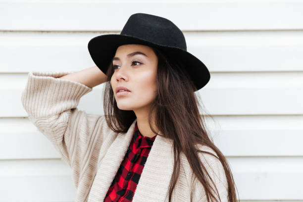 istock Amazing young caucasian lady walking outdoors at beach 1358286700