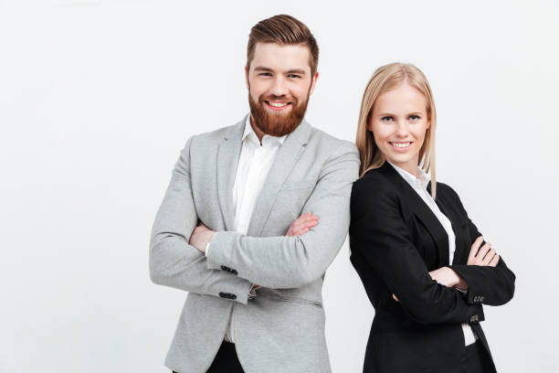 istock Colleagues business team standing over white background 1358286868