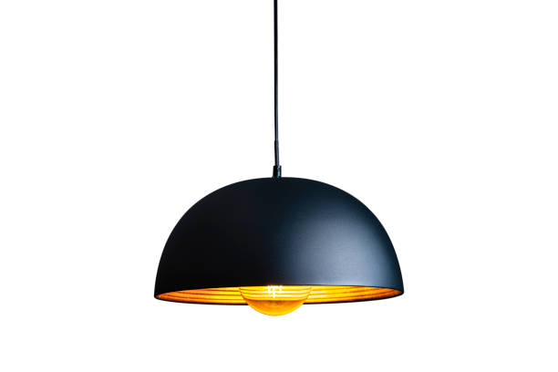 Black modern pendant electric lamp Black illuminated electric lamp hanging from ceiling isolated on white background. High resolution 42Mp studio digital capture taken with Sony A7rII and Sony FE 90mm f2.8 macro G OSS lens ceiling stock pictures, royalty-free photos & images