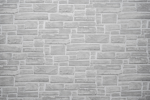 Abstract backgrounds: empty gray brick wall