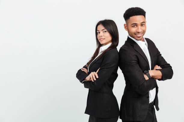 istock Colleagues business team standing over white background isolated 1358288214