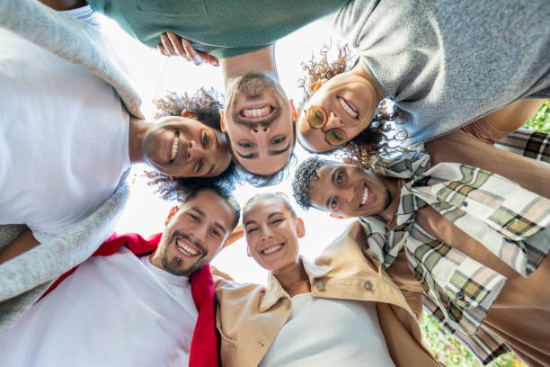 istock Friends huddled together 1358288215