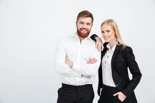 istock Colleagues business team standing over white background 1358288285
