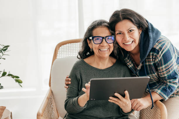 istock Mother and daughter smiling together 1358291021