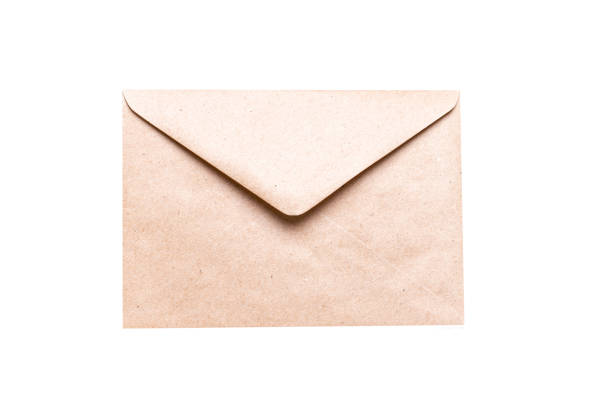 istock Closed brown craft envelope isolated on white background. An envelope for your congratulations 1358293979