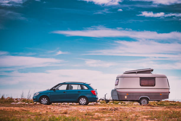 Caravan trailer camping on seashore. Capicorb, Valencia region Spain. Vacation with mobile home.