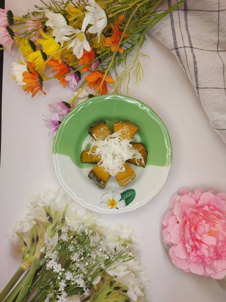 istock Boiled pumpkin and sugar and grated coconut on a plate. 1358298138