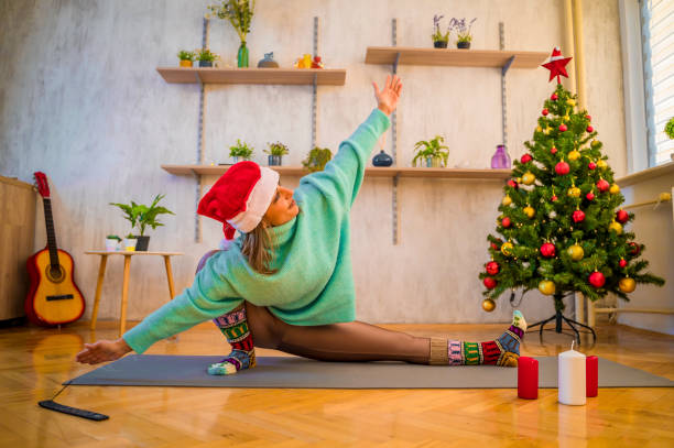 istock Woman doing yoga at home 1358306197