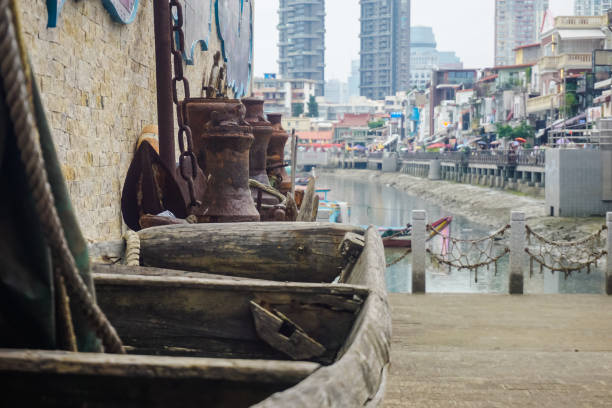 Xiamen, China - June 7, 2019: Old objects of sailors by the pond