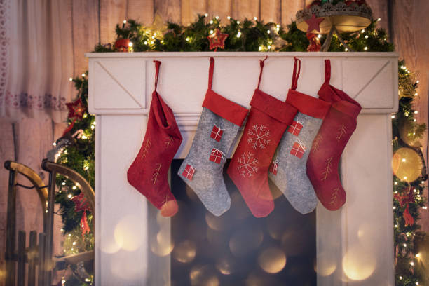 istock the socks by the fireplace. waiting for santa 1358308490
