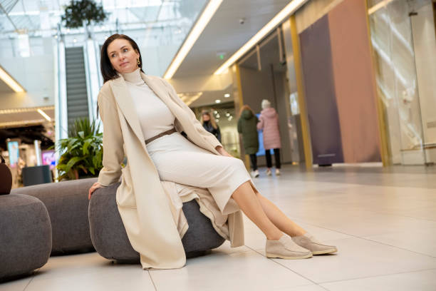 istock beautiful woman in the mall 1358310355