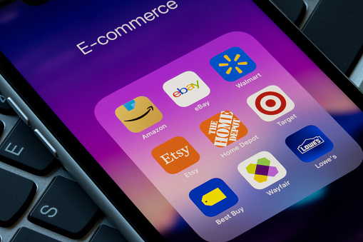 Portland, OR, USA - March 16, 2021: Assorted retail e-commerce mobile apps are seen on an iPhone, including Amazon, eBay, Walmart, Etsy, the Home Depot, Target, Best Buy, Wayfair, and Lowe's.