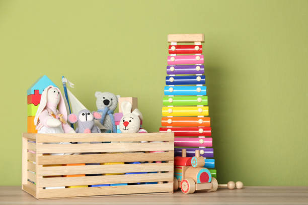 istock Set of different toys on wooden table 1358321163