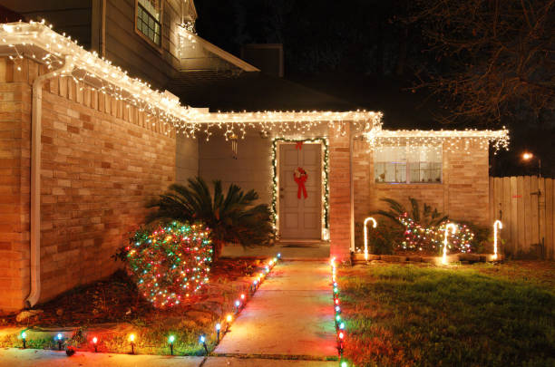 istock home decorated with Christmas lights 1358322337