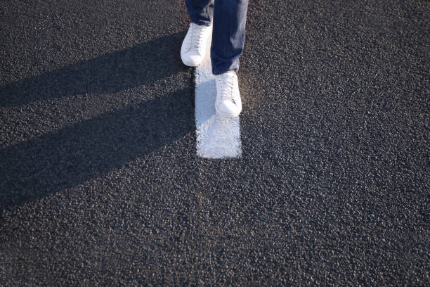 Closeup of a chalk body outline symbolizing a crime scene.  