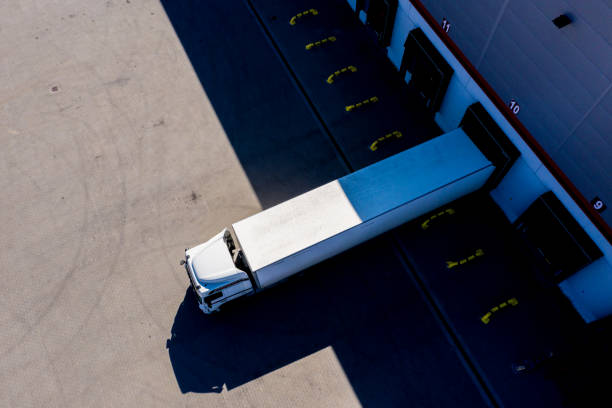 istock Distribution logistics building parking lot. Aerial View 1358326138