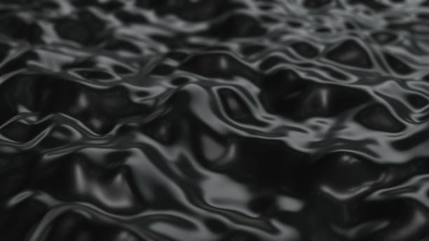 istock Smooth silk wavy flow,   black cloth. Abstract dark noise 1358326243