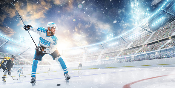 Sport. High concentration. Professional hockey player ready to attack in ice. Sports emotions. Concept of action, team sport game, ad