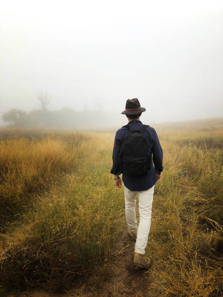 Man Hiking Foggy West Texas Grasslands