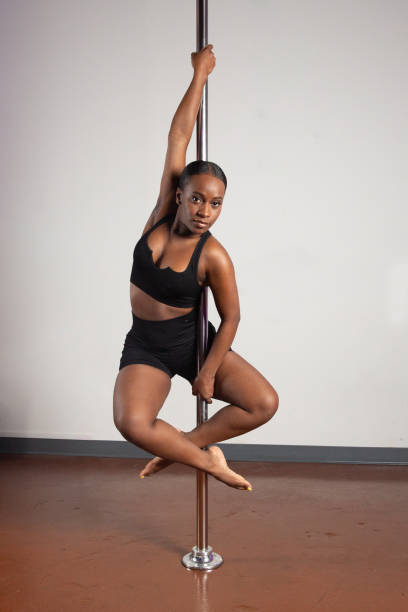 istock Female pole dancer of color 1358344090