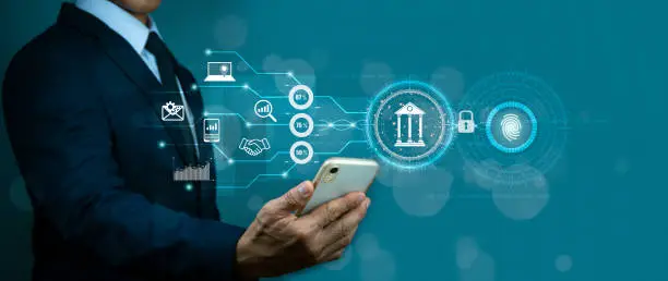 A businessman uses fingerprint identification to gain access to personal financial information.E-kyc(electronic know your customer)concept,biometrics security, digital cybercrime innovation technology