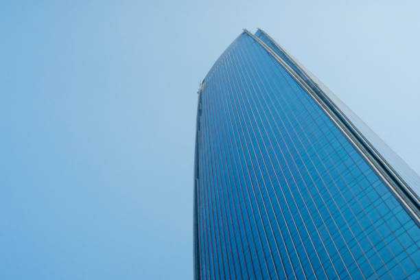istock Minimalist Top of modern office building with clear sky 1358357135