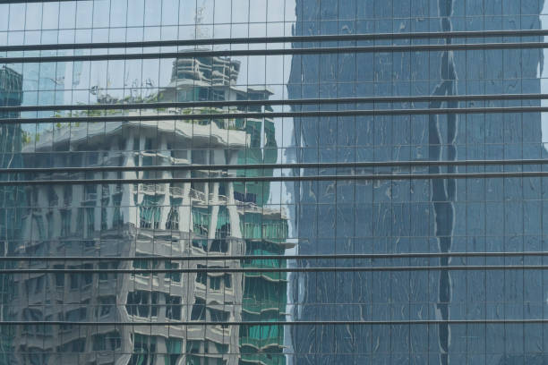 istock Reflection of bulding office from other office building windows 1358357854