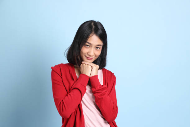 istock Cute Asian Woman 1358361227