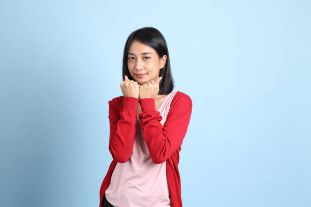 istock Cute Asian Woman 1358361260
