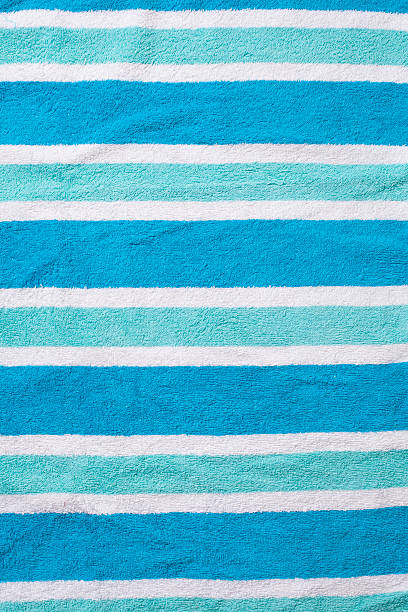 beach towel hintergrund - strandhandtuch stock-fotos und bilder
