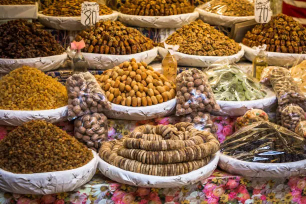 Nutmegs and raisins, dry fruits from a moroccan market shop in the Medina of Fes, Morocco