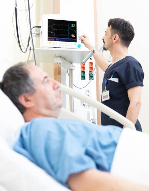 istock Doctor attending patient in intensive care 1358378296