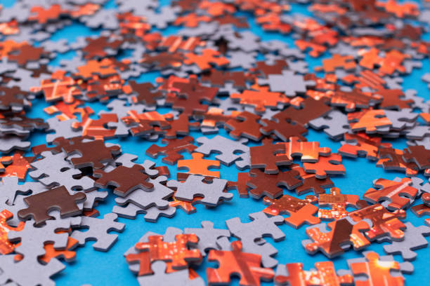 istock Colorful Jigsaw Puzzle on Blue Background 1358380585