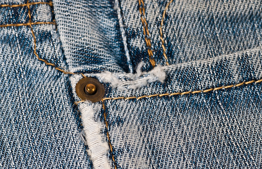 Close up of an old jeans trousers