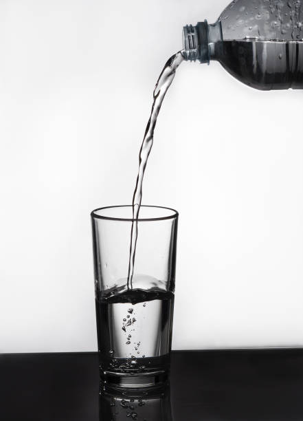 istock water pouring into glass 1358383995
