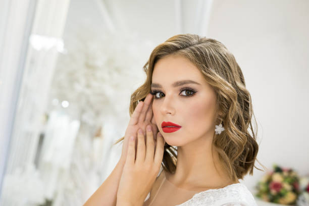 istock beautiful girl with wedding makeup, bride 1358385151