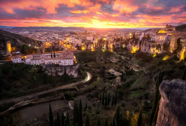 Skyline of Cuenca with his Parador in the old Convent of St Paul and Las casas colgantes (Hanging Houses)  in Castilla-La Mancha at sunset, Spain, Europe
