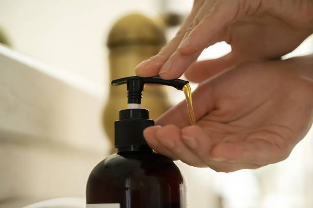 istock Girl washes her hands with soap. 1358389255