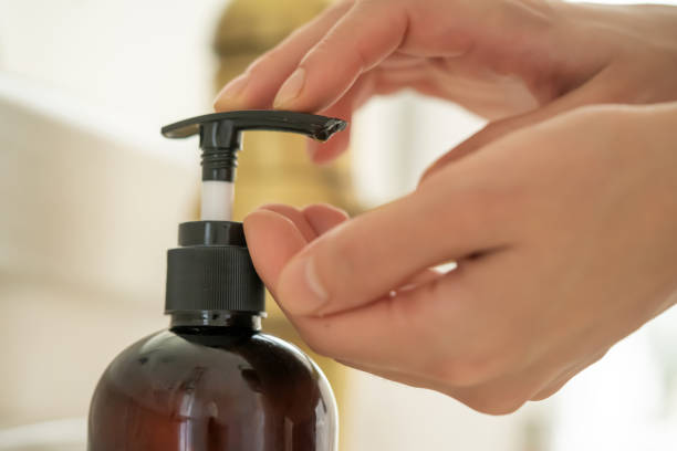 istock Girl washes her hands with soap. 1358389572