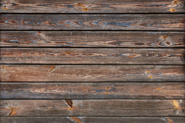 istock weathered wooden planks with paint flakes 1358392810