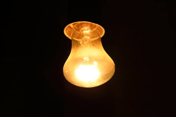 An old room dusty lamp, on a black background.